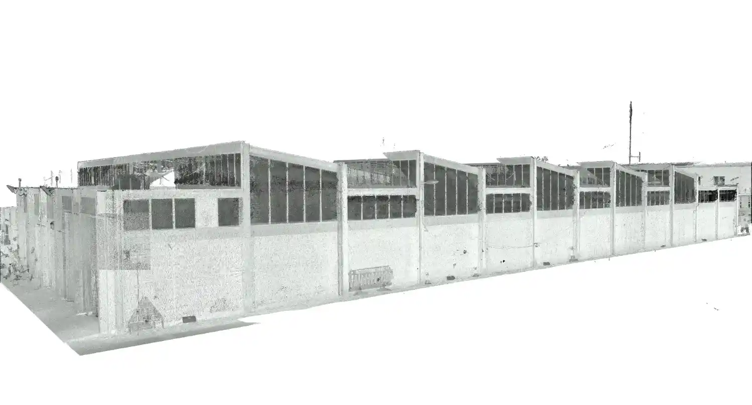 Exterior point cloud laser scan of the police complex block two steel building, capturing the detailed facade and sawtooth roof profile.