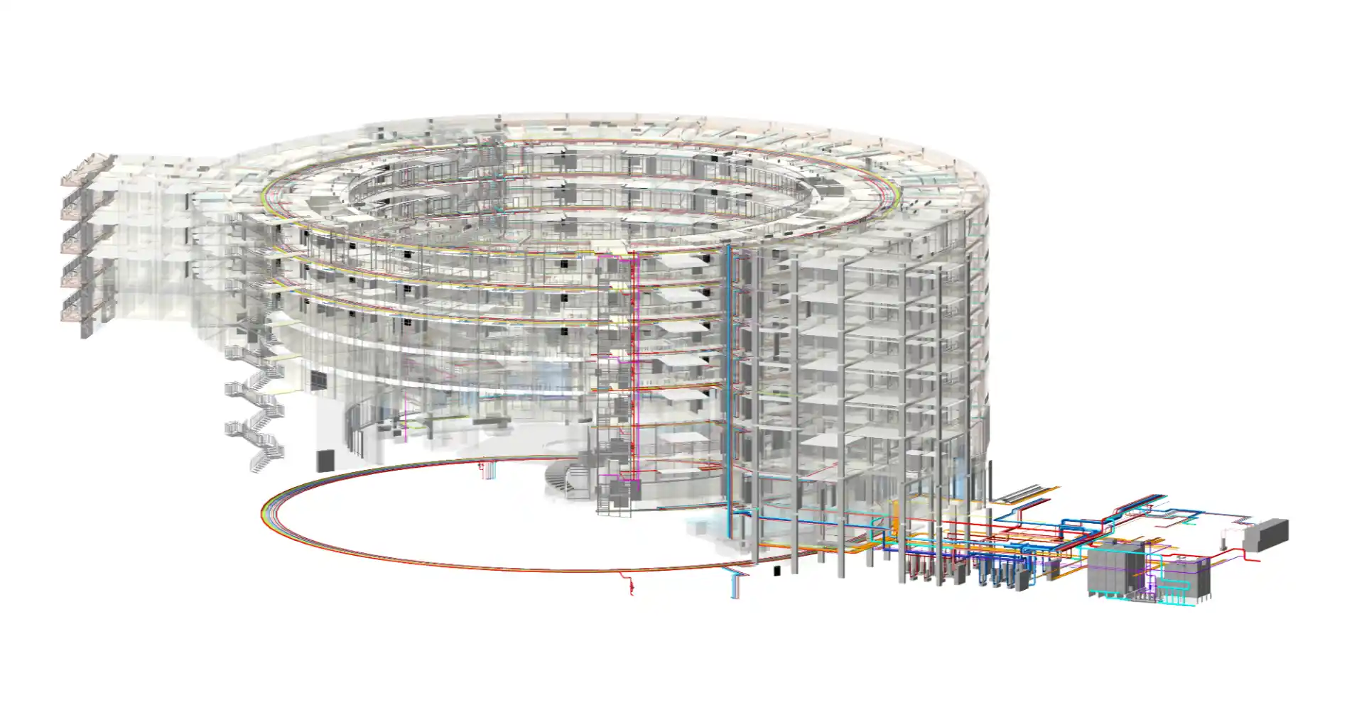 Coordinated multi-discipline MEP BIM model within a complex circular building structure (The TVC Towe) showing vertical service risers.